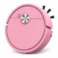 A pink round robotic vacuum cleaner with black cleaning brushes on the side and a silver metallic power button on top, shown on a clean white background.